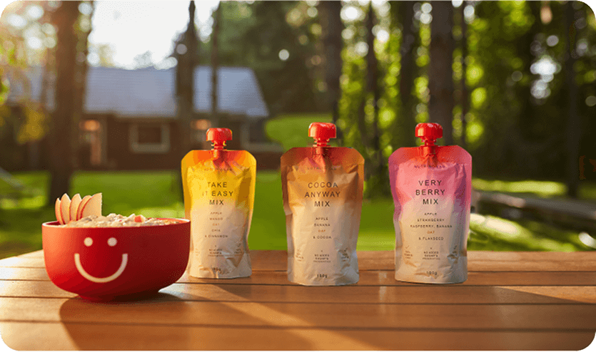 Hydration and helathy breakfast the formula for daily energy table outside in the morning with bowl of Nutrino lab Take it easy mix Cocoa anyway mix copy